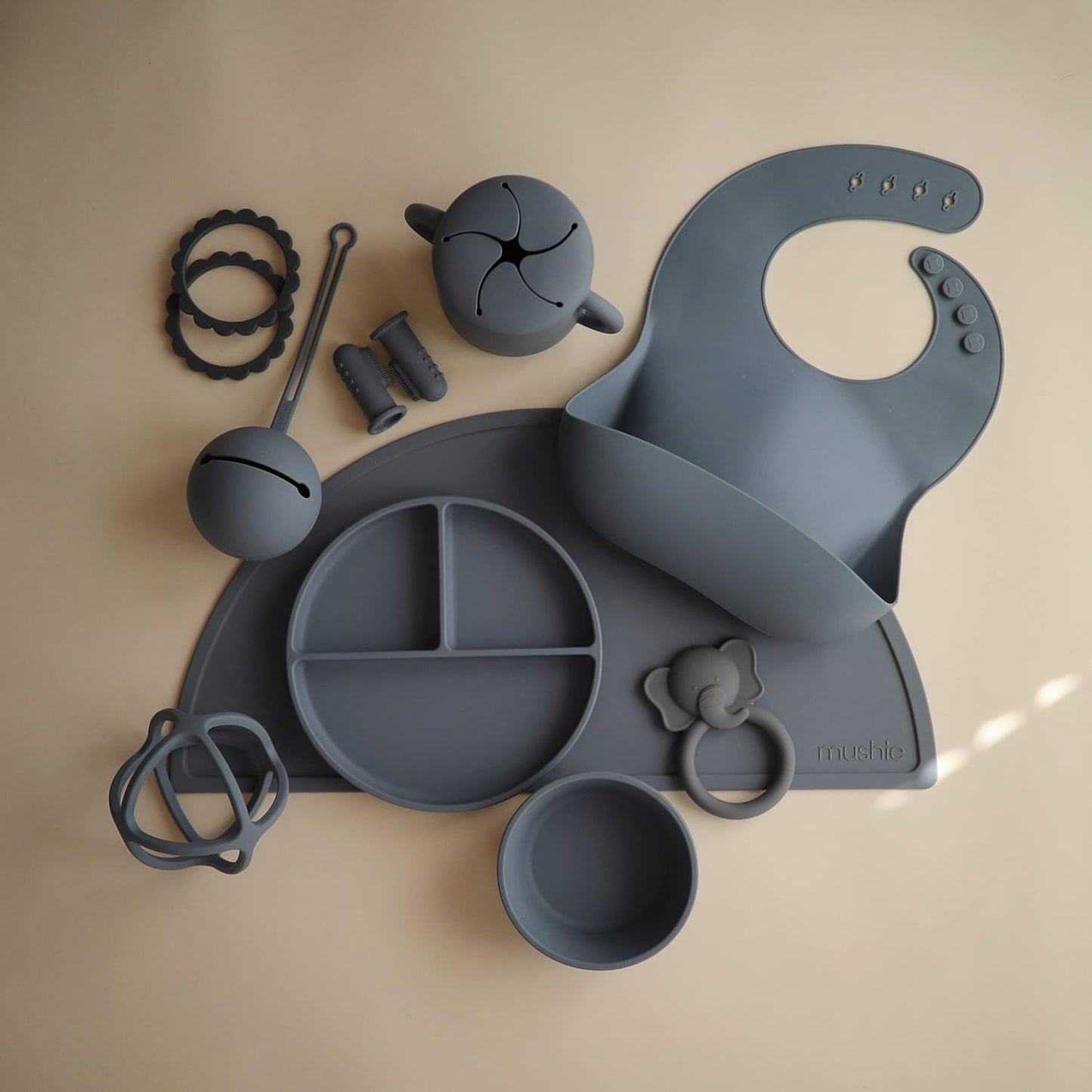 mushie Silicone Baby Bib | Adjustable Fit Waterproof Bibs (Tradewinds)